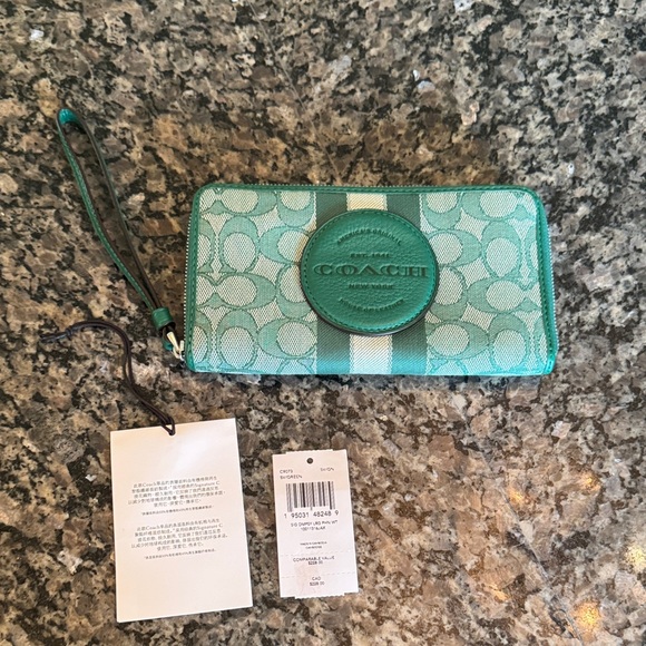 Coach Dempsey large phone wallet with Large coach logo EUC - Picture 1 of 16